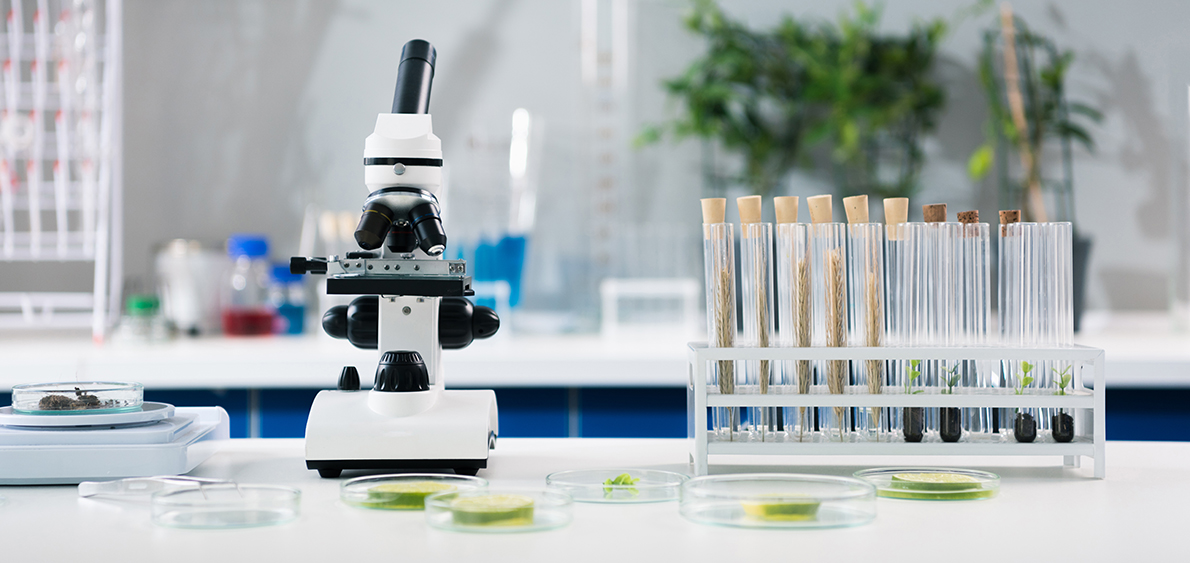 Image of microscope and tubes in lab